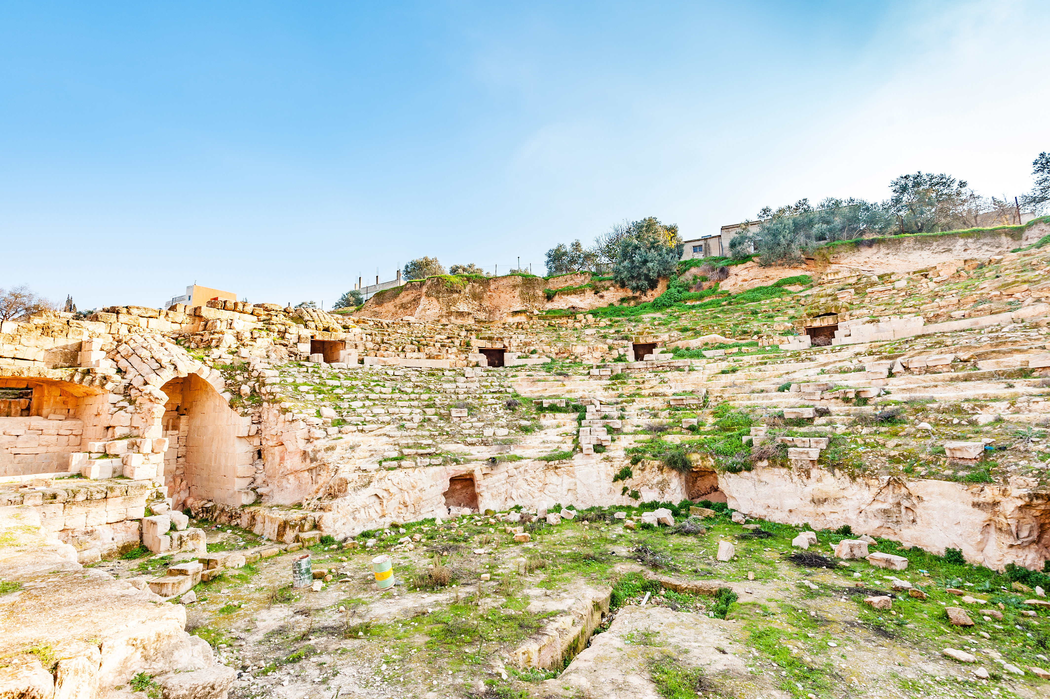 ruins of a stone theatre in capitolias