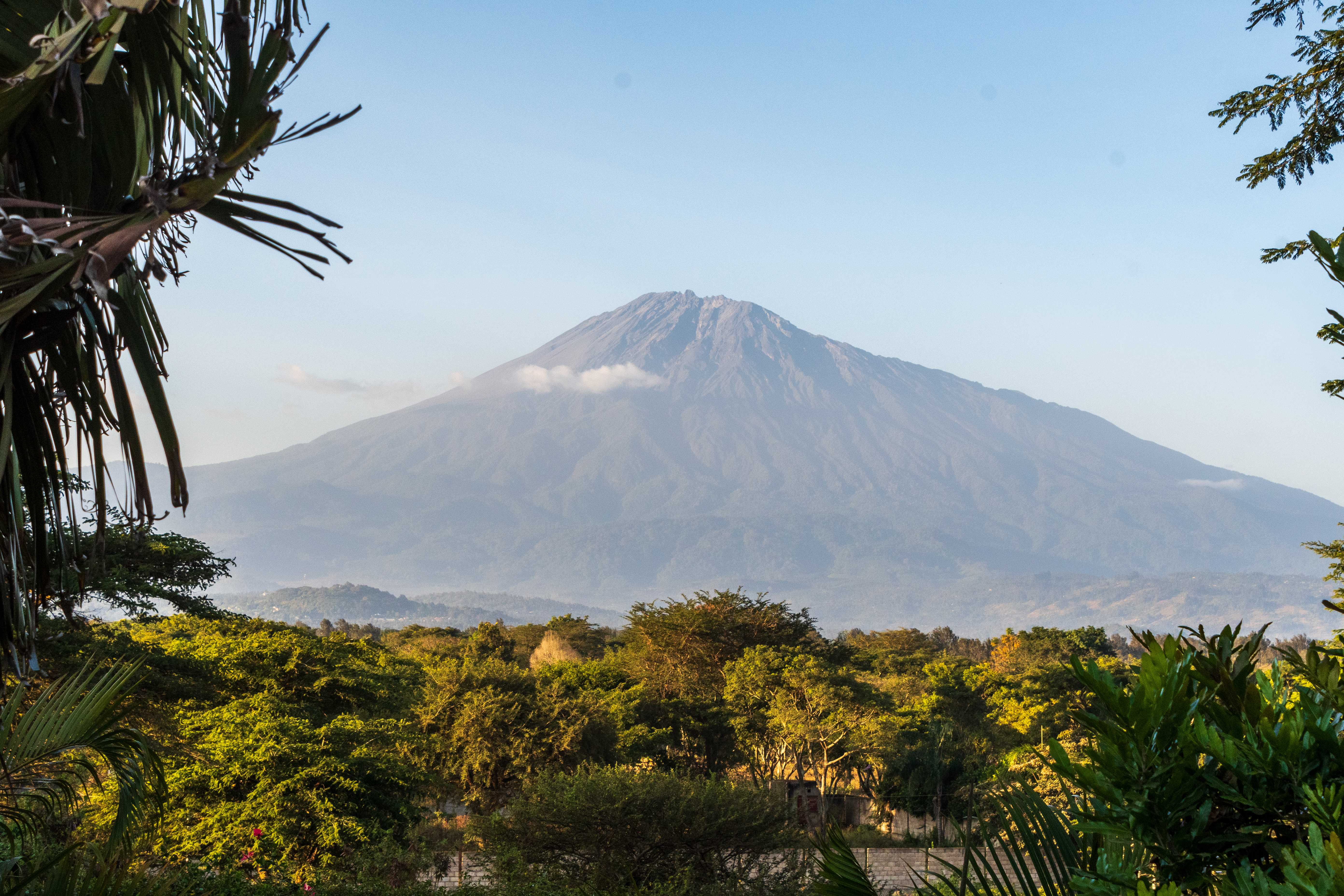 Mount Meru rises from behind the town of Arusha